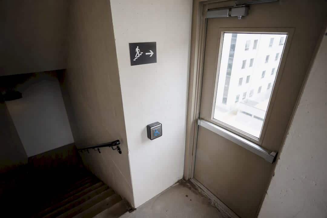 Stairwell exit door with evacuation signage